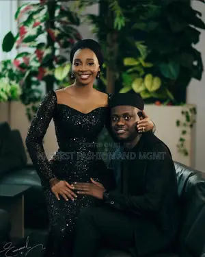 Black Sequin Mermaid Gown and Minimalist Black Tunic Outfit