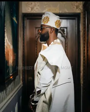 Embellished White Gown and White Agbada With Gold Accents