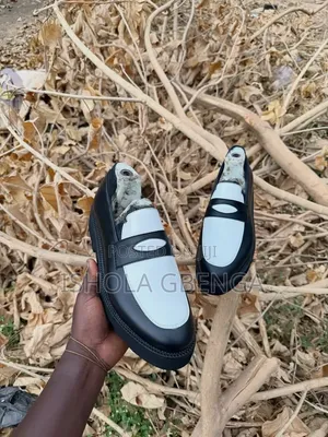 Black Leather Shoe With White Lay Up Design