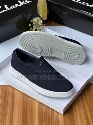 Clarks Men's Slip on Casual Sneakers With White Soles