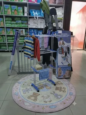 A Foreign-Type Baby Clothes Rack Hanger With Wheels 4 Easy Movement