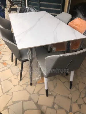 Modern White Marble Set-Finish Table Top and Grey Padded Leather Seats