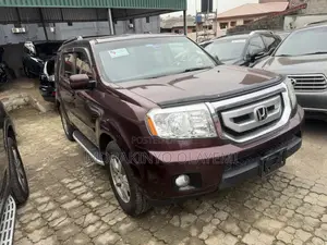 Honda Pilot EX-L 4dr SUV 4WD (3.5L 6cyl 5A) 2010 Red