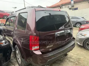 Honda Pilot EX-L 4dr SUV 4WD (3.5L 6cyl 5A) 2010 Red