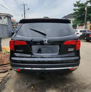 Honda Pilot Touring 4dr SUV 4WD (3.5L 6cyl 9A) 2016 Black
