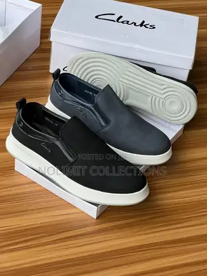 Clarks Men's Slip on Sneakers With White Soles Classic