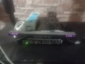 ModdedWii With Wii Sports+ Wii Sports Resortand twoWiiremotes/nunchuks
