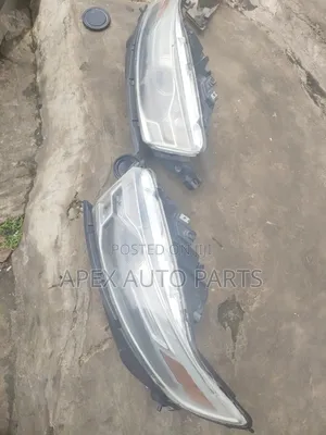 Clean Tokunbo Complete Headlamp Set for Ford Taurus (Original OEM)