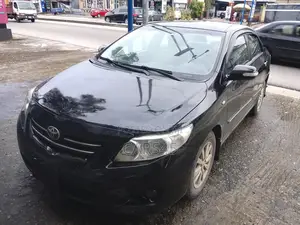 Toyota Corolla Base 4dr Sedan (1.8L 4cyl 5M) 2010 Black