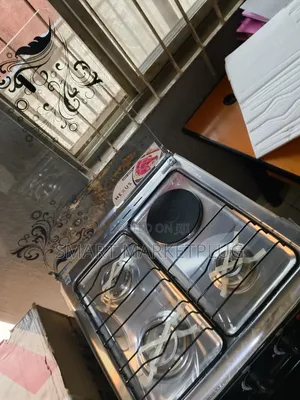 New in Nx-5055 (3+1) Electric Gas Cooker With Hot Tempered Glass Cover