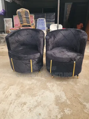 Neatly Padded Single Sofa Chair.