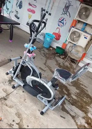 Orbitrac Bike With Twister Dumbbells and Stepper