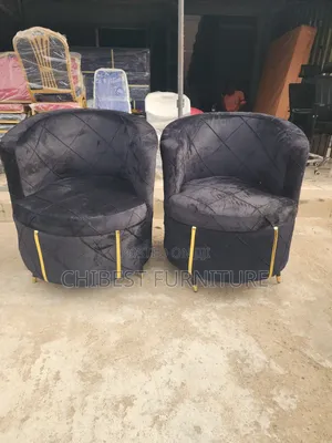 Black Coloured Single Sofa Chair.