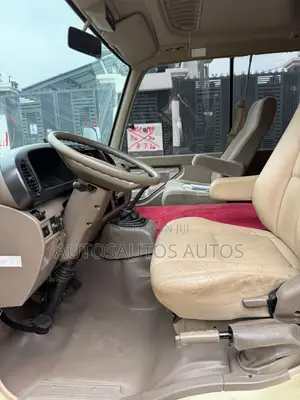 Toyota Coaster 2015 Gold