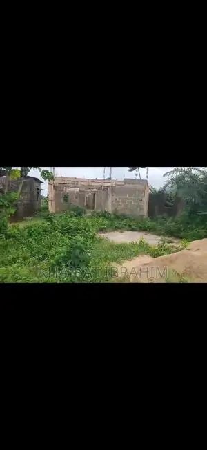 Half Plot of Land With Uncompleted Building for Sale