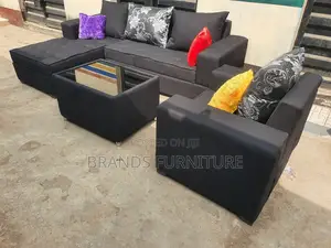 Quality Black Sofa With Center Table N a Single Seater