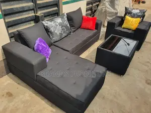 Quality Black Sofa With Center Table N a Single Seater