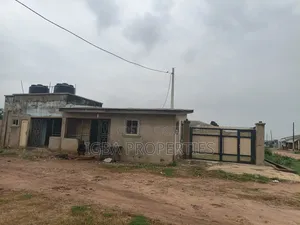 Half Plot+security Hse and 2 Shops Fenced Round + Gate at Ikorodu 22m