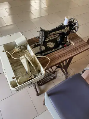 Manual and Electric Sewing Machine