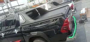Rolling Boot Cover and TRD Spoiler for Toyota Hilux