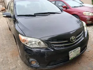 Toyota Corolla Base 4dr Sedan (1.8L 4cyl 5M) 2010 Black