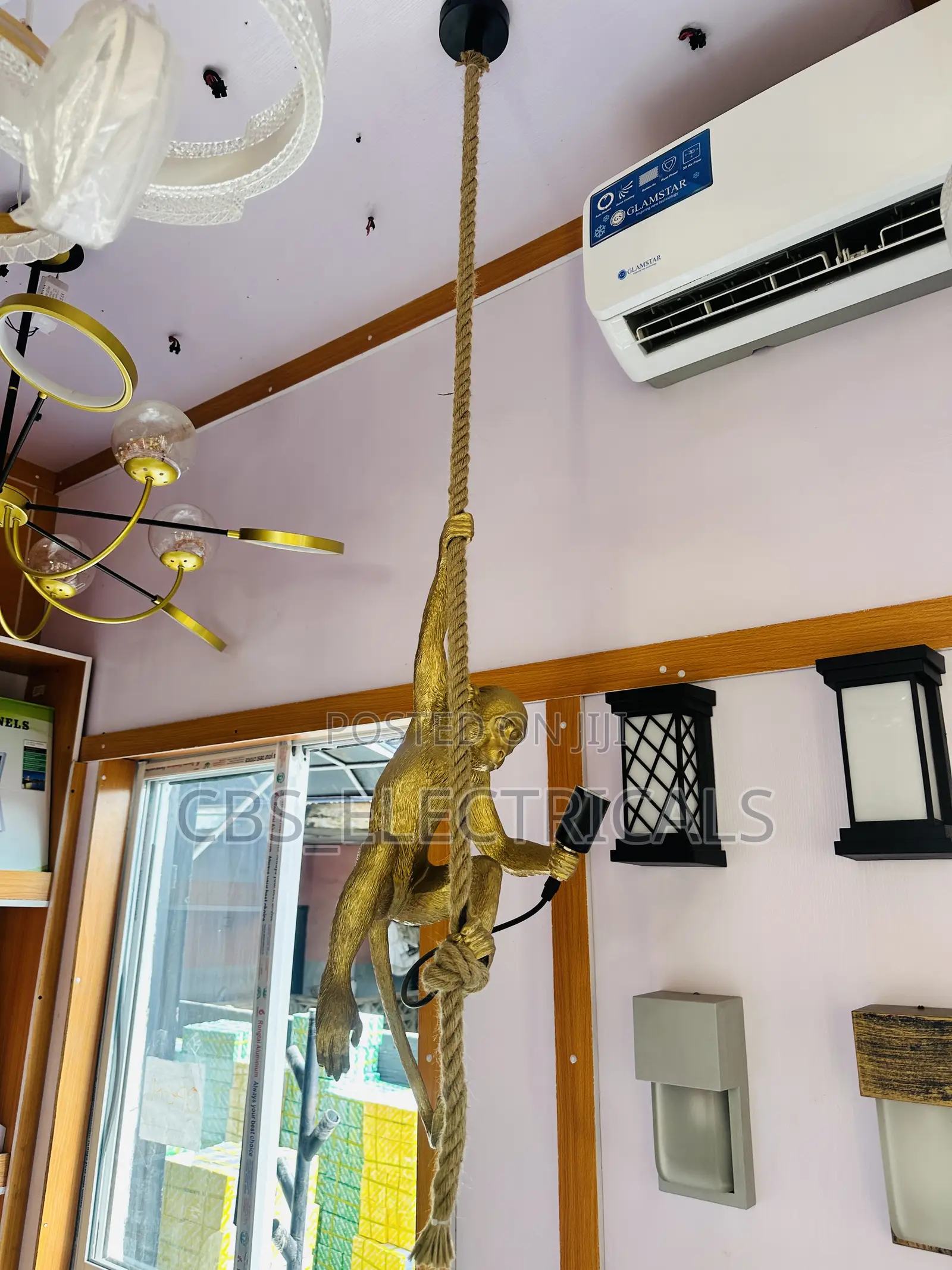 Hand-Sculpted Climbing Monkey Rope Pendant Light