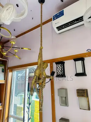 Hand-Sculpted Climbing Monkey Rope Pendant Light