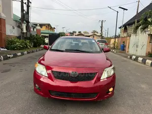 Toyota Corolla LE 4dr Sedan (1.8L 4 cyl 4A) 2009 Red