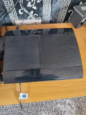 PS 3 Super Slim With 2 Pads and 5 Games