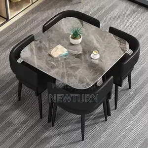 Four Seaters Leather Chairs With Marble Table Dining Set.