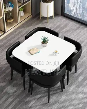 Four Seaters Leather Chairs With Marble Table Top.