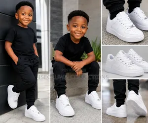 High-Quality Nike White Black Children's Sneakers With Nike Tag.