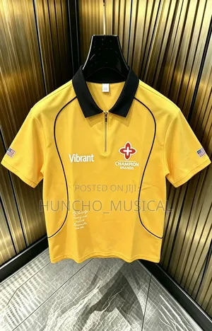 Champion Brands Polo Shirt Features a Vibrant Yellow Color and a Black