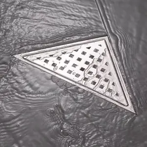 An Exploded View of a Triangular Stainless Steel Floor Drain,