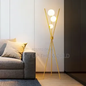 Gold Standing Lamp With Globe