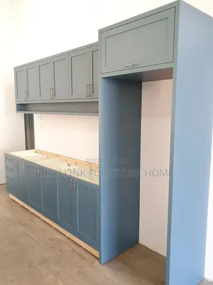 Custom Slate Blue Kitchen Cabinetswith Tall Fridge Niche