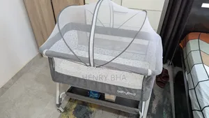 4-in-1 Baby Bassinet With Rocker, Mosquito Net, Changing Mat Storage