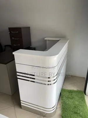Modern High-Gloss White Reception Desk With Silver Stripe Accent