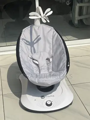 Foreign Barely Used 4moms Rockaroo Swing