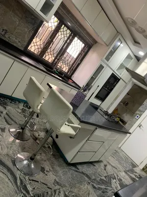 Quality Kitchen Cabinets With Marble Top and High Ladder Table