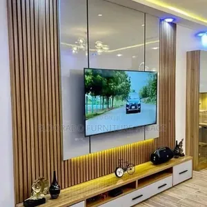 Quality Full Board Television Console With Flutted Panel Designs