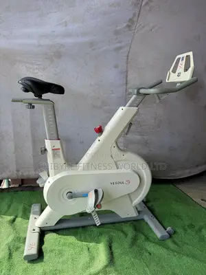 White Commercial Spin Bike With iPad Holder