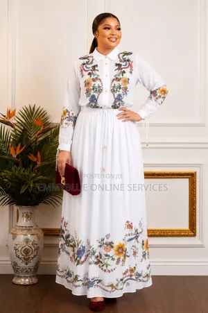 A White Two-Piece Shirt and Maxi Skirt Set (Or Shirt-Style Maxi Dress)