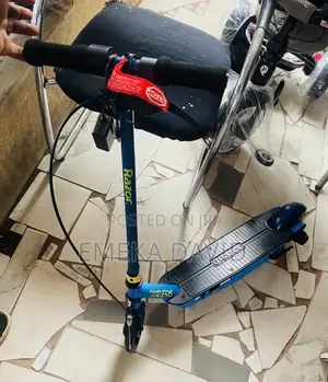 Power Core Electric Scooter in Blue With Black Foam Handlebar Grips.