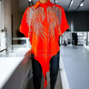 Shirt Featuring Pointed Drop Hemline. Short-Sleeve Button-Down Blouse.