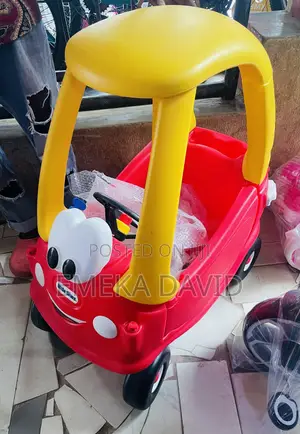 Classic Little Tikes Cozy Coupe Ride-on Toy.