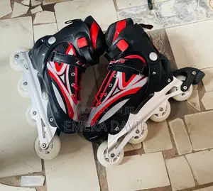 Generic Inline Adjustable Skates in a Red and Black Color.
