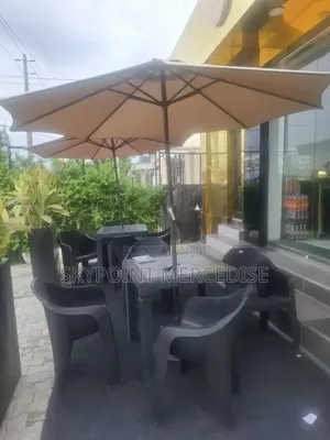 Set of Lugano Table and Four Chairs