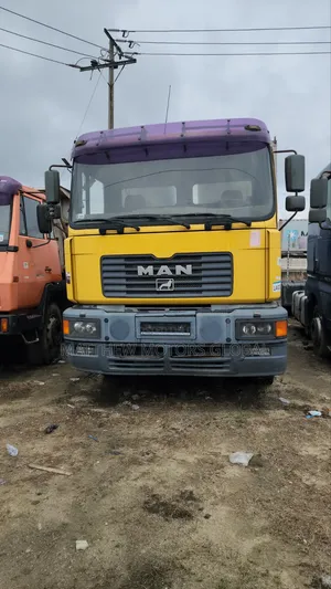 Clean Foreign Used Man Diesel Truck, 10 Tires.