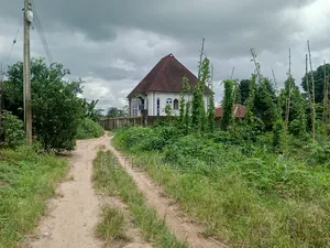 Fenced and Gated Land by the Road for Sal After Sunrise Umuchichi Aba